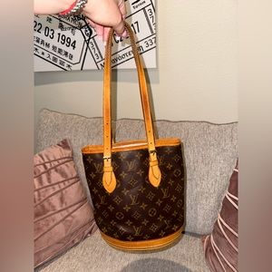 Authentic Louis Vuitton PM bucket handbag.